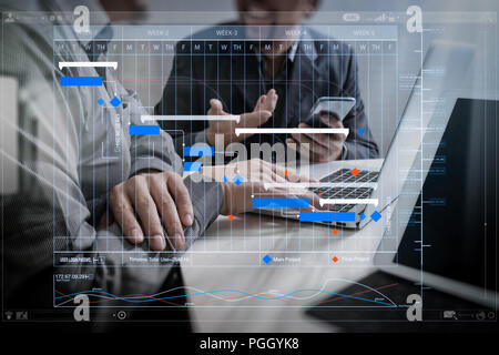 Project manager working and update tasks with milestones progress planning and Gantt chart scheduling virtual diagram.Business team meeting. Photo pro Stock Photo