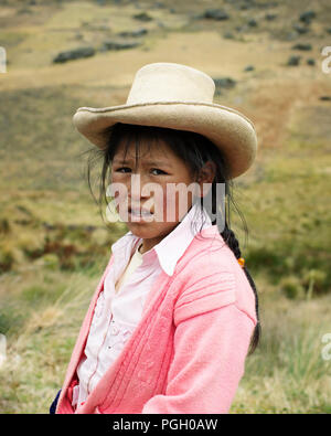 Close-up portrait of a native Peruvian girl in Cumbe Mayo archeological site. Cajamarca, Peru. Jul 2018 Stock Photo