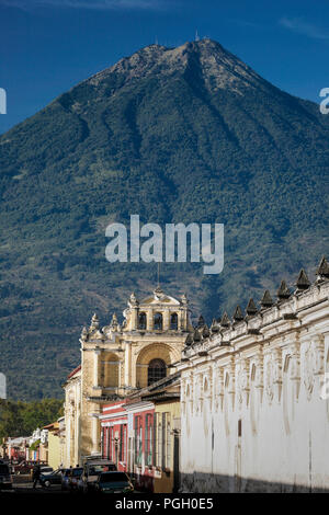 Old buildings of Antigua Guatemala and Volcan de Agua (Volcano of Water) in the background, Guatemala Stock Photo