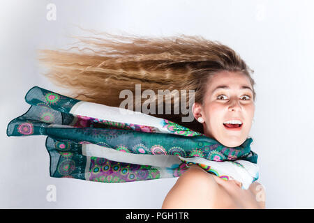 Long hair of woman blown by the wind Stock Photo