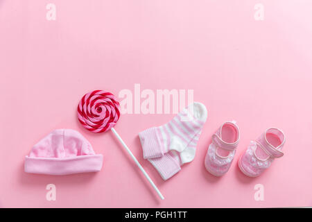 Baby girl shower concept on pink background, top view, copy space Stock Photo