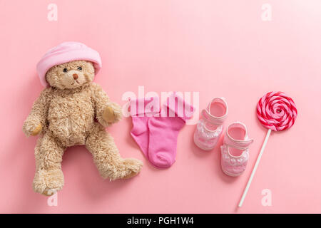 Baby girl shower concept on pink background, top view, copy space Stock Photo
