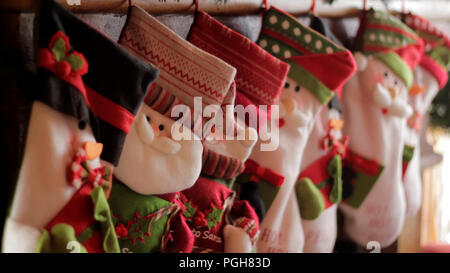 Christmas socks on fireplace Stock Photo