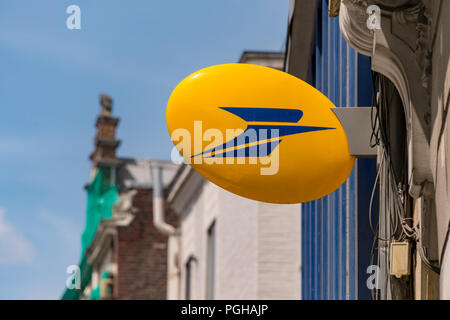 Lille, France - 15 June 2018: Logo of La Poste, French national postal service on Rue Nationale. Stock Photo