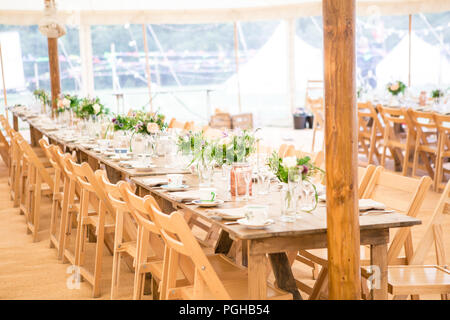 Tables Set With Vintage Retro Crockery For Afternoon Tea Party