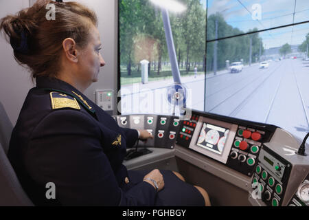 St. Petersburg, Russia - August 23, 2018: Head of the training center of the urban electrical transport enterprise Victoria Tolstikova in the tram sim Stock Photo