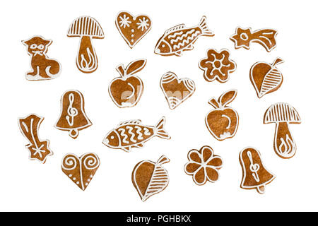 Set of Christmas and New Year gingerbreads. Collection of sweet hand-decorated pastries with aromatic flavor. Cute confections of various shapes. Stock Photo