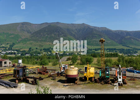 A fine view of Blencathra from the Threlkeld Mining museum near Keswick in the English Lake District shows some of the industrial exhibits in the fore Stock Photo