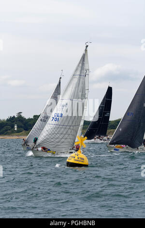 Sailing Yacht Andaxi rounds the buoy on its way to victory in the Contessa 32 Class race at the Cowes Week Regatta in the Solent Stock Photo