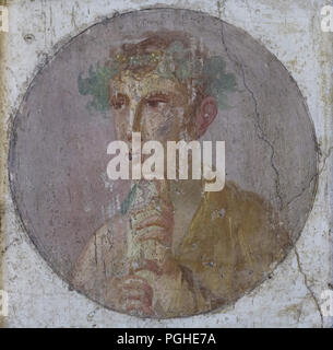 Medallion with a portrait of a young poet with parchment roll and ivy garland depicted in the Roman fresco from the Insula Occidentalis in Pompeii (1-79 AD), now on display in the National Archaeological Museum (Museo Archeologico Nazionale di Napoli) in Naples, Campania, Italy. Stock Photo