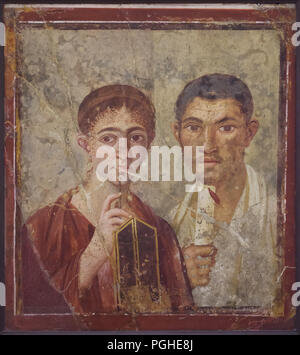 Portrait of Pompeian baker Terentius Neo and his wife, previously known as the portrait of Paquius Proculus and his wife, depicted in the Roman fresco from Pompeii (20-30 AD), now on display in the National Archaeological Museum (Museo Archeologico Nazionale di Napoli) in Naples, Campania, Italy. Stock Photo