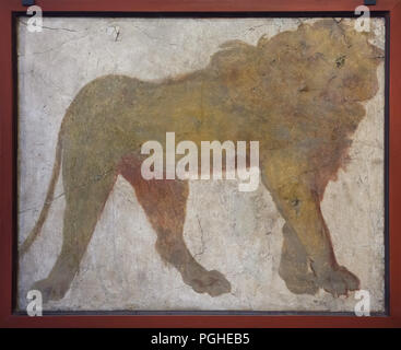 Lion depicted in the Roman fresco from the sanctuary of the Temple of Isis (Tempio di Iside) in Pompeii, now on display in the National Archaeological Museum (Museo Archeologico Nazionale di Napoli) in Naples, Campania, Italy. Stock Photo