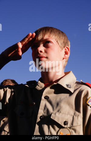 Boy Scout saluting, Scout salute to statue of Lord Baden Powell Stock ...