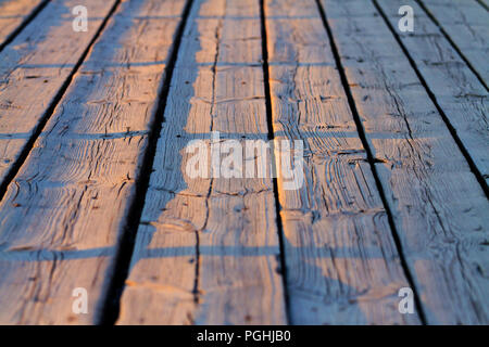 nice textured boards in perspective at sunset Stock Photo