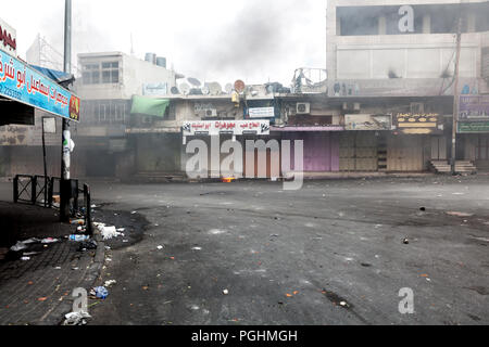 Hebron, Palestine, November 29, 2013:   Devastated street during riots in Hebron’s old town. Stock Photo