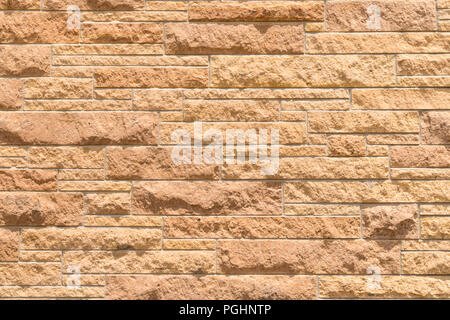 Old masonry historic stone wall background Stock Photo