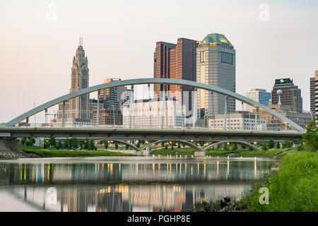 COLUMBUS, OH - JUNE 17, 2018: Columbus, Ohio City Skyline and the Main Street Bridge along the Scioto River Stock Photo