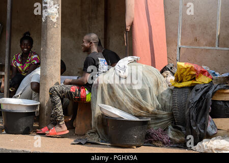 CENTRAL REGION, GHANA - Jan 17, 2017: Unidentified Ghanaian people talk about something in local village. People of Ghana suffer of poverty due to the Stock Photo