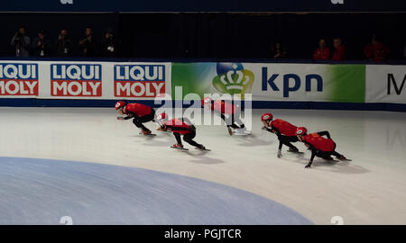 The Chinese men's short track speed skating team practicing for the relay at the ISU World Cup event in Montreal on March 17, 2018. Stock Photo