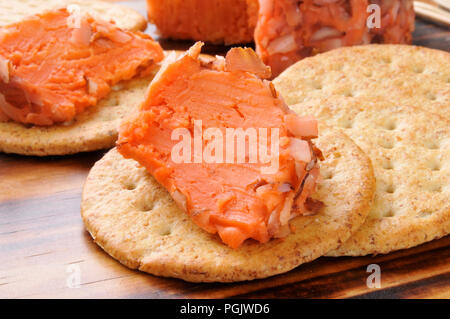 Closeup of a whole wheat cracker with port wine and cheddar cheese Stock Photo