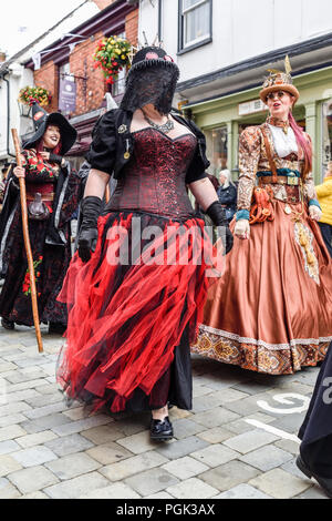 Lincoln, UK.27th August 2018: The biggest steampunk event in the world takes place this bank holiday weekend many taking part travelling from Australia, USA, Etc. Monday is parade day down Bailgate into Lincoln castle, crowds lined the streets to cheer them on. Credit: Ian Francis/Alamy Live News Stock Photo