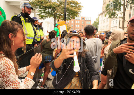 Powis Square, London, UK, 27th August 2108, Notting Hill Carnival goers at a street party, Carnival performers, © Richard Soans/Alamy Live News Stock Photo