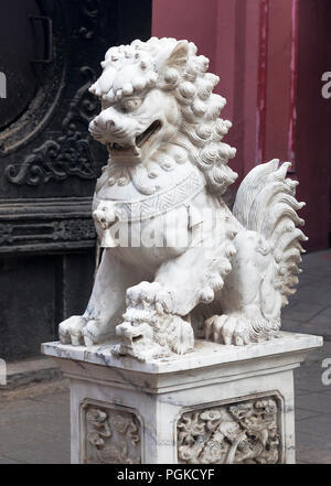 Chinese lion at the entrance of a temple Stock Photo