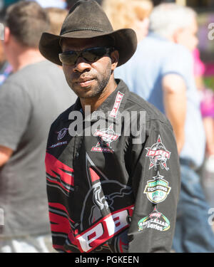 Portrait of a young Aboriginal man wearing a black cowboy hat and sunglasses, Far North Queensland, FNQ, QLD, Australia Stock Photo