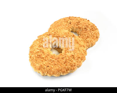 Two shortbread ring cookies with nuts. Sand ring with nuts isolated,white background. Shortcrust ring isolated on white with clipping path.Traditional Stock Photo