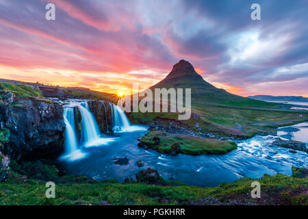 Colorful sunrise on Kirkjufellsfoss waterfall Stock Photo