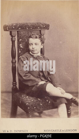 Newcastle & London CDV (Carte De Visite) of a Victorian Boy Sat on a Chair Stock Photo