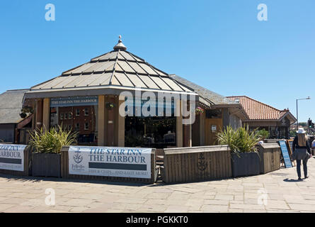 The Star Inn the Harbour pub restaurant in summer Whitby North Yorkshire England UK United Kingdom GB Great Britain Stock Photo