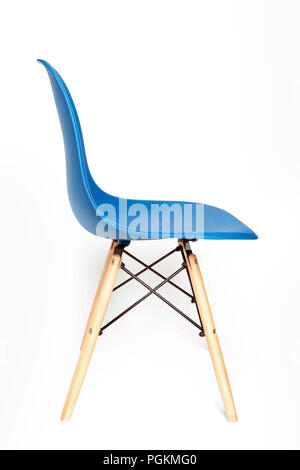 Blue modern chair with wooden legs isolated on white background Stock Photo