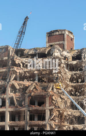 Rock Island, Illinois - Workers use a wrecking ball to demolish the Rock Island Plow Company building. Subsequently used by J.I. Case, the building ha Stock Photo