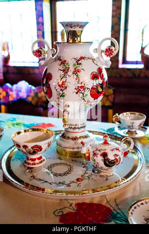 Russian Tea Ceremony with Samovar standing on the Table Stock Photo