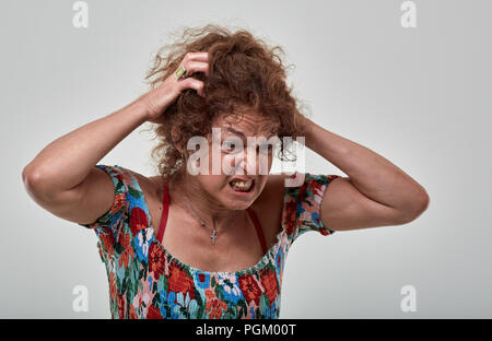 Portrait of a very angry mature woman Stock Photo