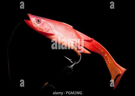 An old rubber Red Gill of Mevagissey Cornwall sea fishing lure designed for catching predatory fish such as pollack or cod. From a collection of fishi Stock Photo
