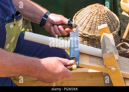 Carpenter using shave horse with hand tools, Herefordshire County Fair Ross on Wye UK. August 2018 Stock Photo