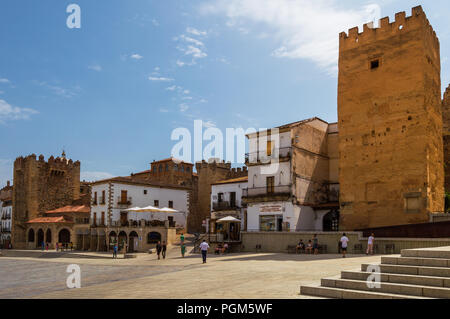 Plaza Mayor of Caceres in a beautiful and sunny day. Monumental walled square full of ancient buildings. Center of life and commerce of the city. Stock Photo