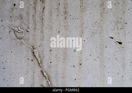 old rough cement wall with grunge caused of rain Stock Photo