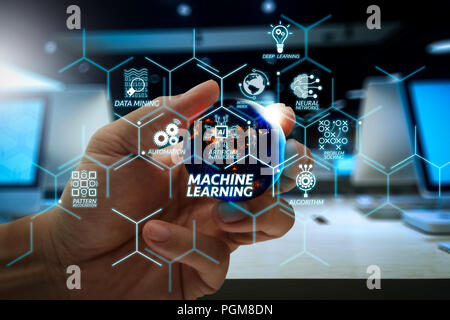 Machine learning technology diagram with artificial intelligence (AI),neural network,automation,data mining in VR screen.hand showing the earth.Elemen Stock Photo