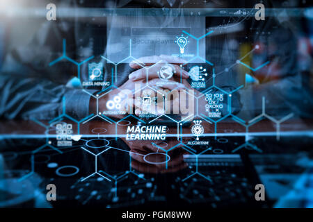 Machine learning technology diagram with artificial intelligence (AI),neural network,automation,data mining in VR screen.businessman hands using digit Stock Photo