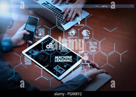 Machine learning technology diagram with artificial intelligence (AI),neural network,automation,data mining in VR screen.businessman hands using digit Stock Photo