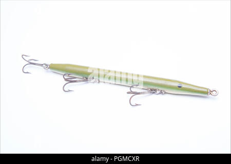 An old wooden fishing lure equipped with three treble hooks for catching predatory fish. From a collection of vintage and modern fishing tackle. North Stock Photo