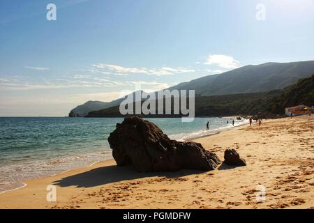 Crystalline waters, white sand and rock textures of Galapinhos Beach between mountains in Portugal Stock Photo
