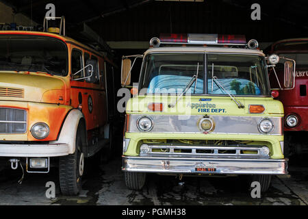 Old fire trucks at fire brigade station in Corinto, Chinandega, Nicaragua Stock Photo