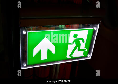 Exit sign on black background Stock Photo