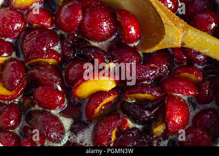 Homemade, plum jam, background, cooking, top view Stock Photo