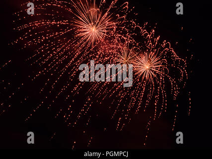 red fireworks, fireworks effect on dark sky background Stock Photo