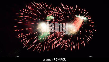 fireworks in different colors, fireworks effect on dark sky background Stock Photo